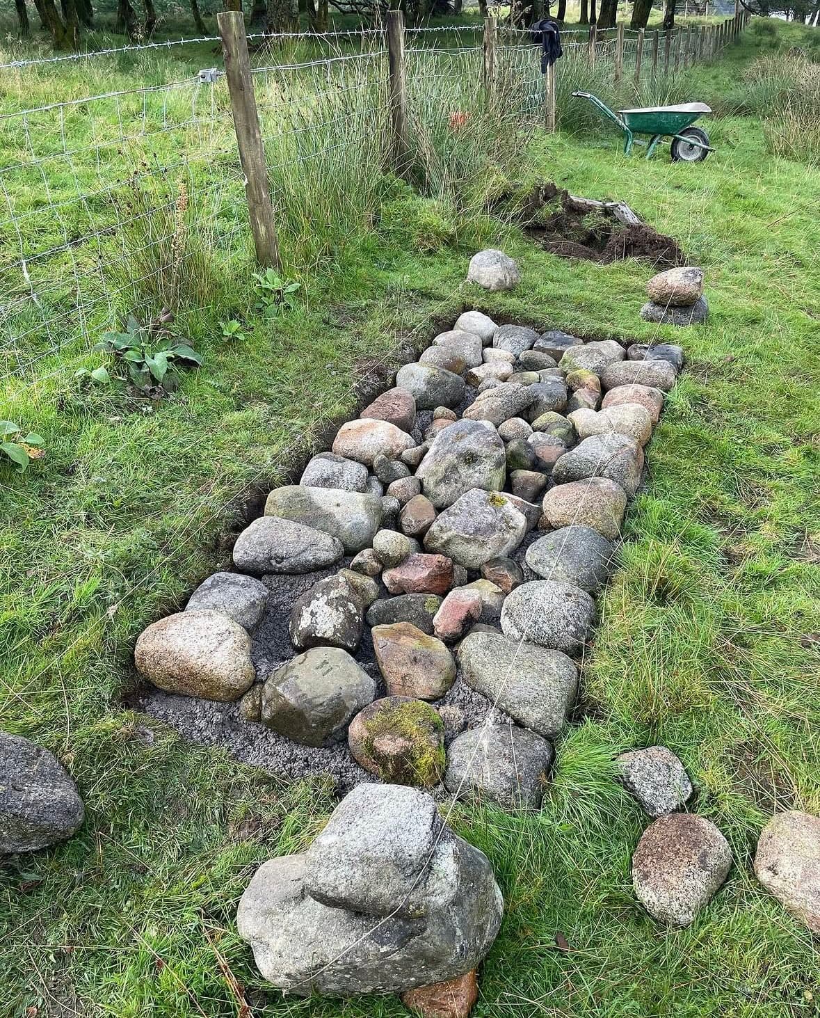 Stone seat and cairn image 7